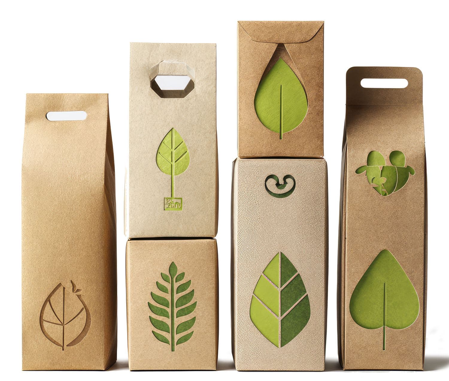Verpackungen aus Kraftkarton mit ausgestanzten und geprägten Blattmotiven